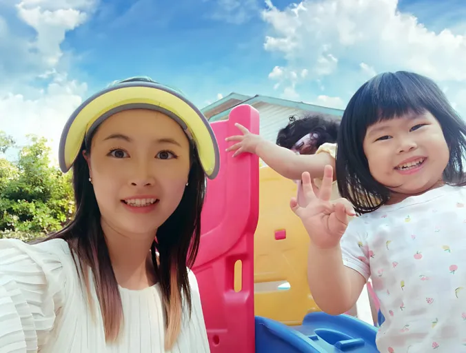 Tingting and children in a Surrey daycare classroom